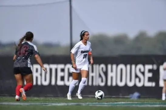 Mia Sardella on the ball during a match.