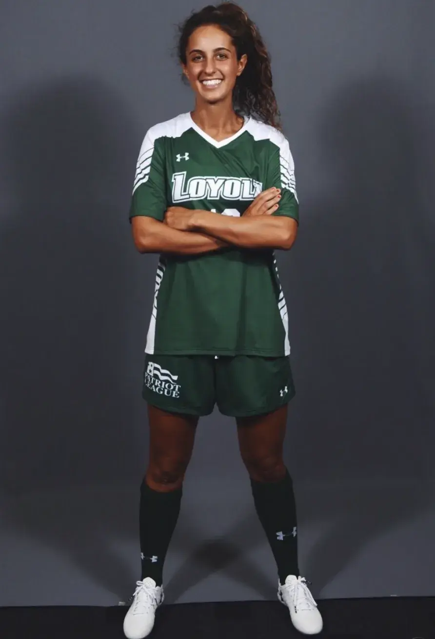 Mia Sardella, full-length team portrait.