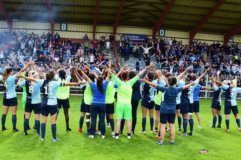 Morgan Crable's Le Havre AC side applauding the home support after a match.